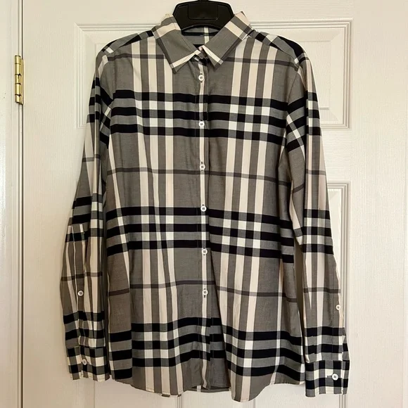 Burberry Black and White Checkered Blouse
Great preloved condition. Size 8. - Picture 1 of 3